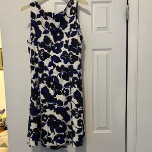 Jessica Howard White Dress with Blue and Black Floral Print. Missing the belt